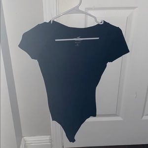 Low neck black body suit